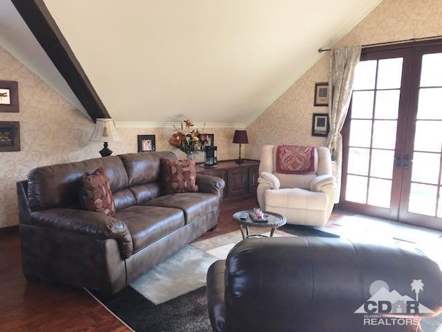 59373 Hop Patch Spring Road Mountain Center, CA 92561 - Photo 20 of 41 a living room with furniture and a large window