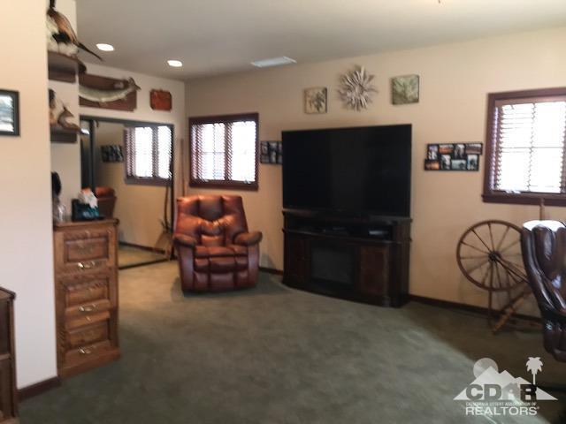 59373 Hop Patch Spring Road Mountain Center, CA 92561 - Photo 26 of 41 a bedroom with furniture and natural light
