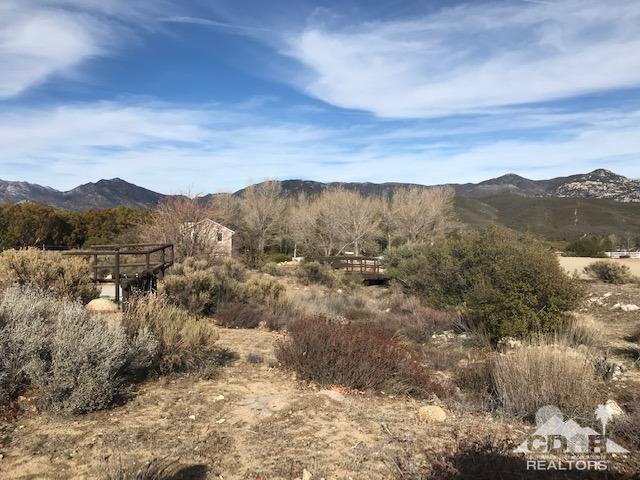 59373 Hop Patch Spring Road Mountain Center, CA 92561 - Photo 29 of 41 a view of a town with mountains in the background
