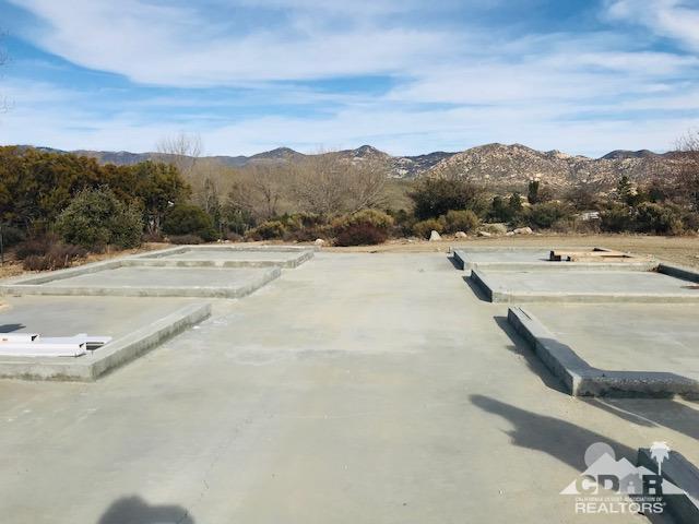59373 Hop Patch Spring Road Mountain Center, CA 92561 - Photo 36 of 41 a view of a swimming pool with a lake view and mountain view