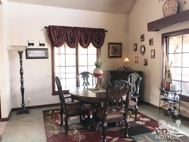 59373 Hop Patch Spring Road Mountain Center, CA 92561 - Photo 9 of 41 a view of a dining room with furniture and window