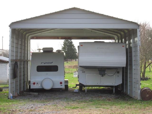 1384 Bailey Road Hillsboro, TN 37342 - Photo 4 of 20 Located between the house and barn is this double car carport. As you can see it will easily accommodate a very large RV.