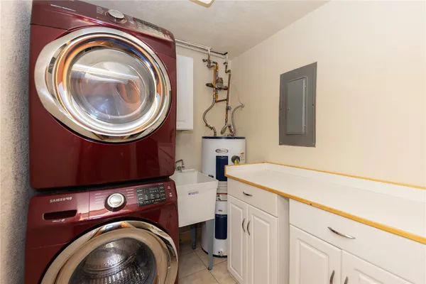 a storage room with dryer and washer