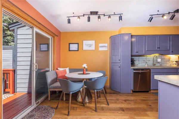 a kitchen with a sink cabinets and window