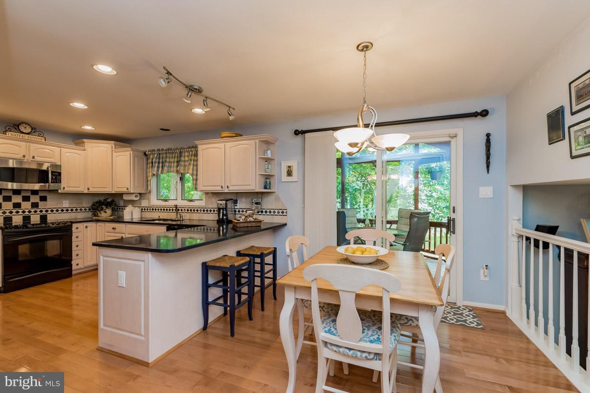 6918 Parchment Rise Columbia, MD 21044 - Photo 8 of 30 Breakfast Area with slider to screened porch