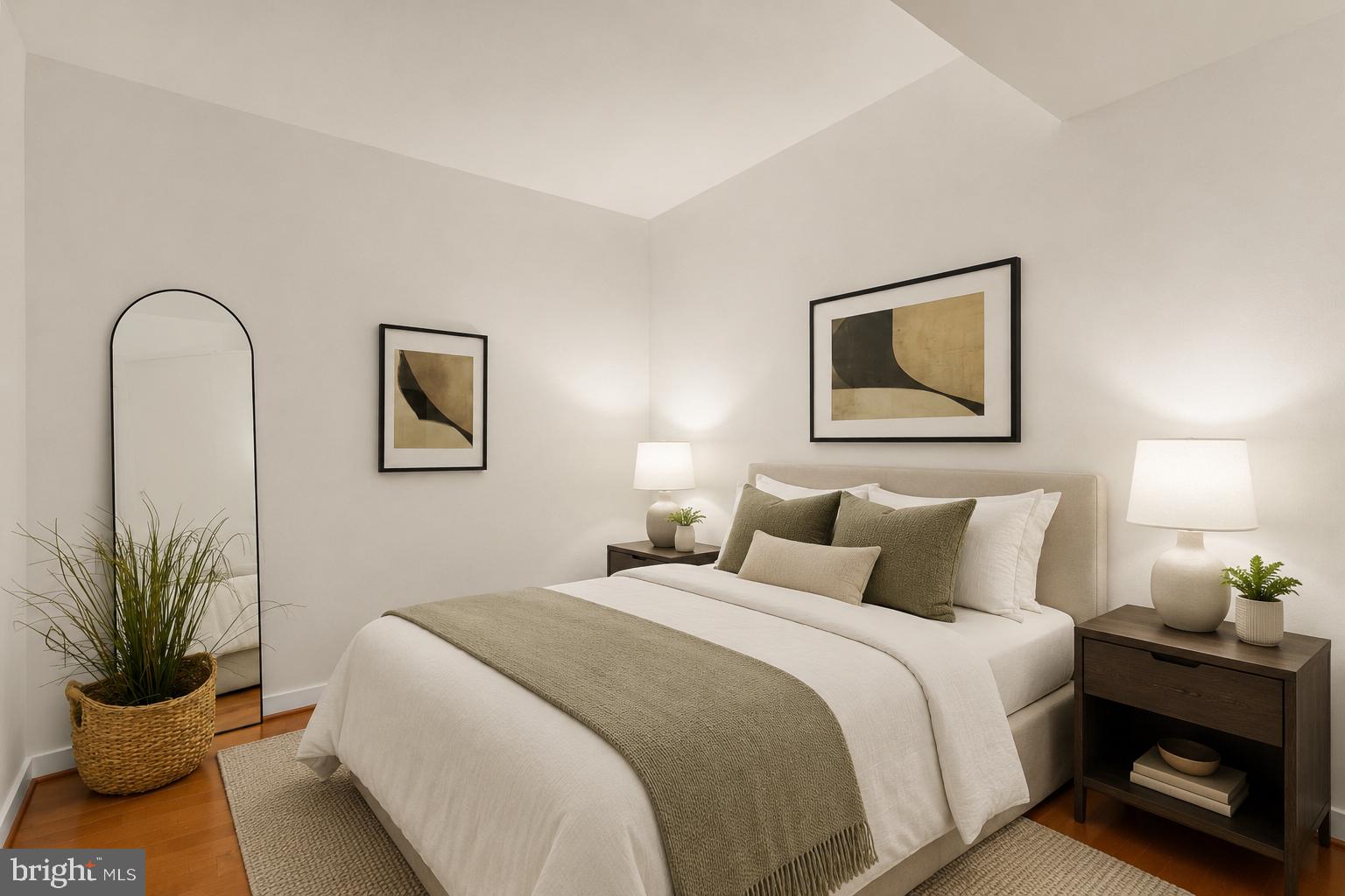 1025 First Street Southeast, Unit 510 Washington, DC 20003 - Photo 14 of 25 a bedroom with a bed and a potted plant