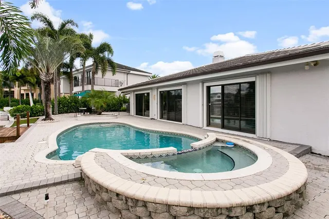 a view of outdoor space yard and swimming pool