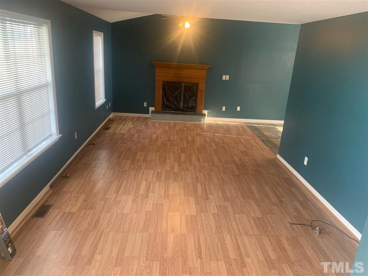 2201 Bufflehead Road Raleigh, NC 27616 - Photo 4 of 5 a view of an empty room and glass door