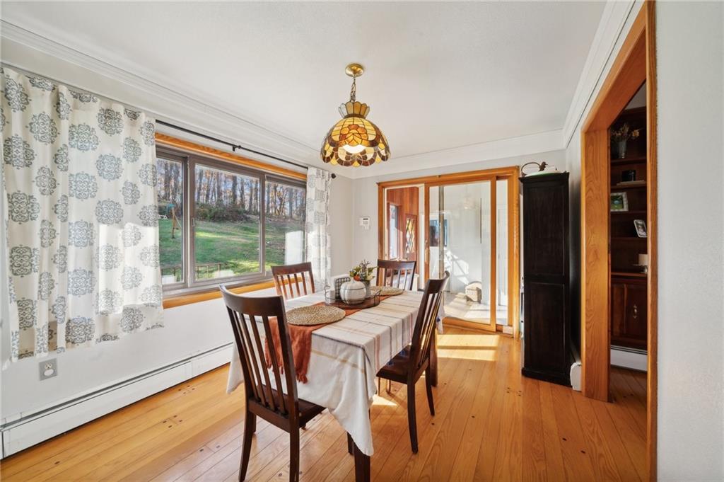 146 Jacobs Drive Boswell, PA 15531 - Photo 16 of 35 a dining room with furniture a chandelier and wooden floor