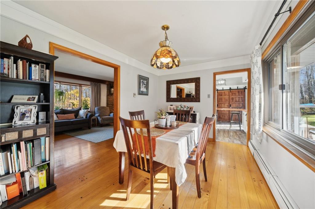 146 Jacobs Drive Boswell, PA 15531 - Photo 17 of 35 a view of a dining room with furniture window and wooden floor