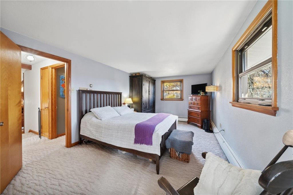 146 Jacobs Drive Boswell, PA 15531 - Photo 26 of 35 a bedroom with a bed wooden floor and window