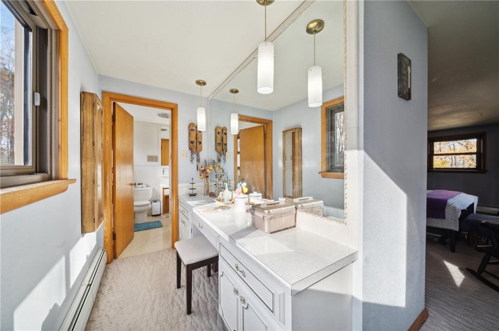 146 Jacobs Drive Boswell, PA 15531 - Photo 27 of 35 a large white room with a large window and a table