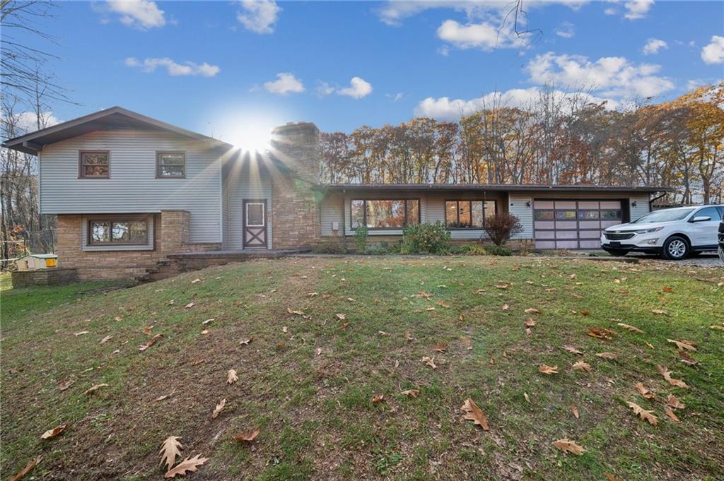 146 Jacobs Drive Boswell, PA 15531 - Photo 33 of 35 a view of a house with a yard and plants