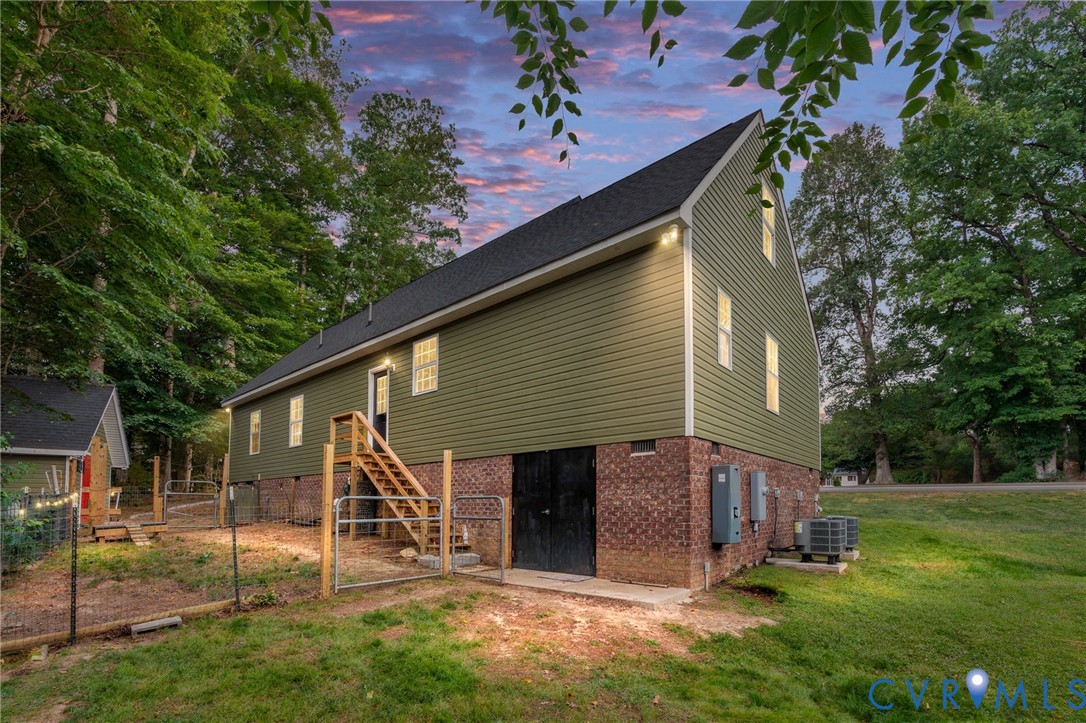 1755 Dispatch Road Quinton, VA 23141 - Photo 72 of 86 a view of a house with a yard