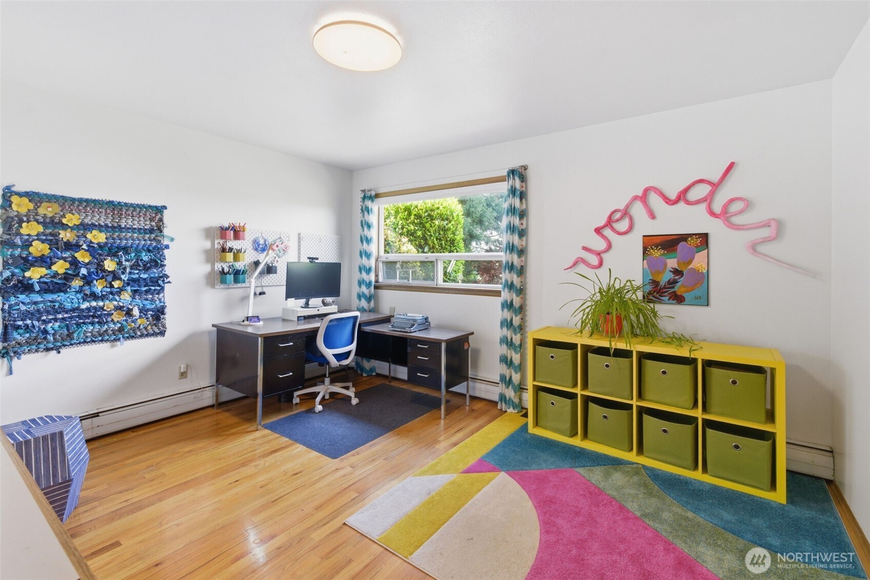 2803 South Walker Street Seattle, WA 98144 - Photo 15 of 40 a view of a workspace with furniture and a workspace