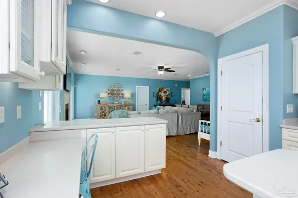 a bathroom with a bathtub and a window