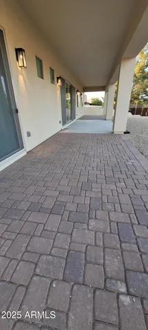 a view of empty room with windows