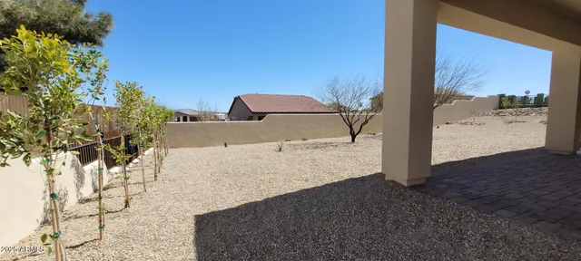 a view of balcony with wooden floor