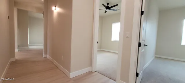 a view of a bathroom with a glass door