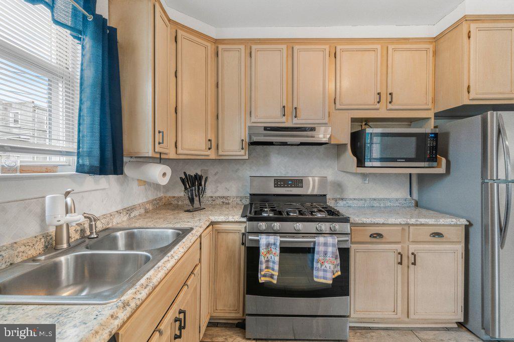 4117 Granite Road Baltimore, MD 21206 - Photo 12 of 38 Modern kitchen with sleek finishes.