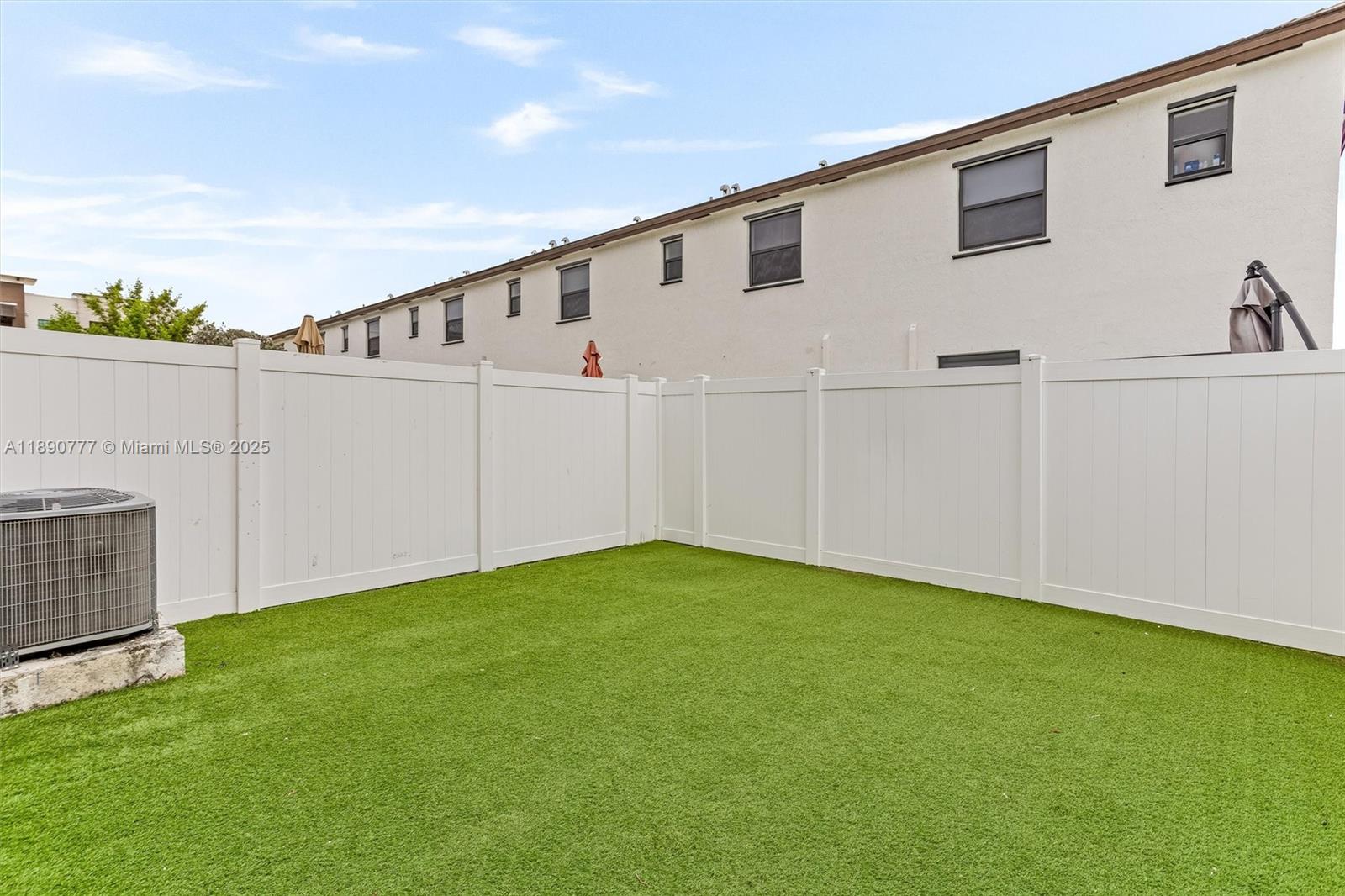 3411 West 112th Terrace Hialeah, FL 33018 - Photo 15 of 42 a view of a house with backyard