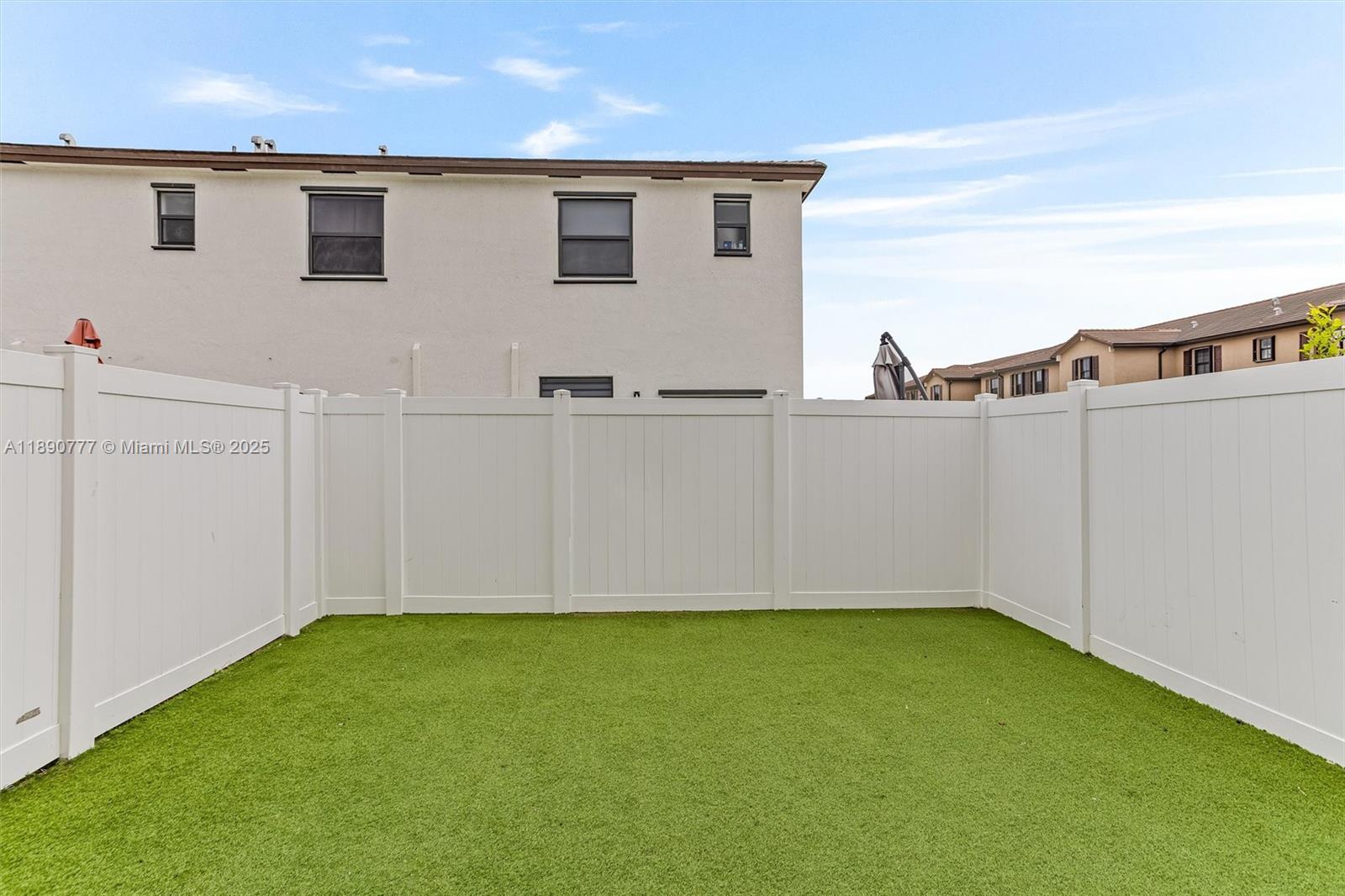 3411 West 112th Terrace Hialeah, FL 33018 - Photo 17 of 42 a view of a backyard