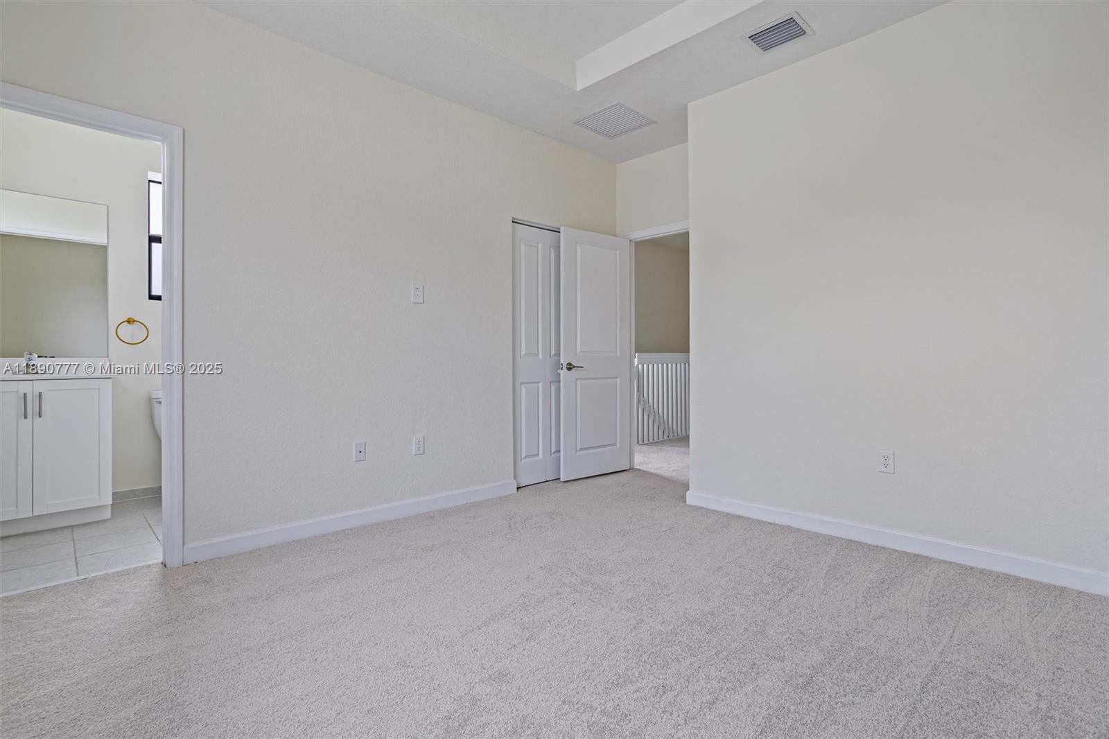 3411 West 112th Terrace Hialeah, FL 33018 - Photo 19 of 42 a view of an empty room