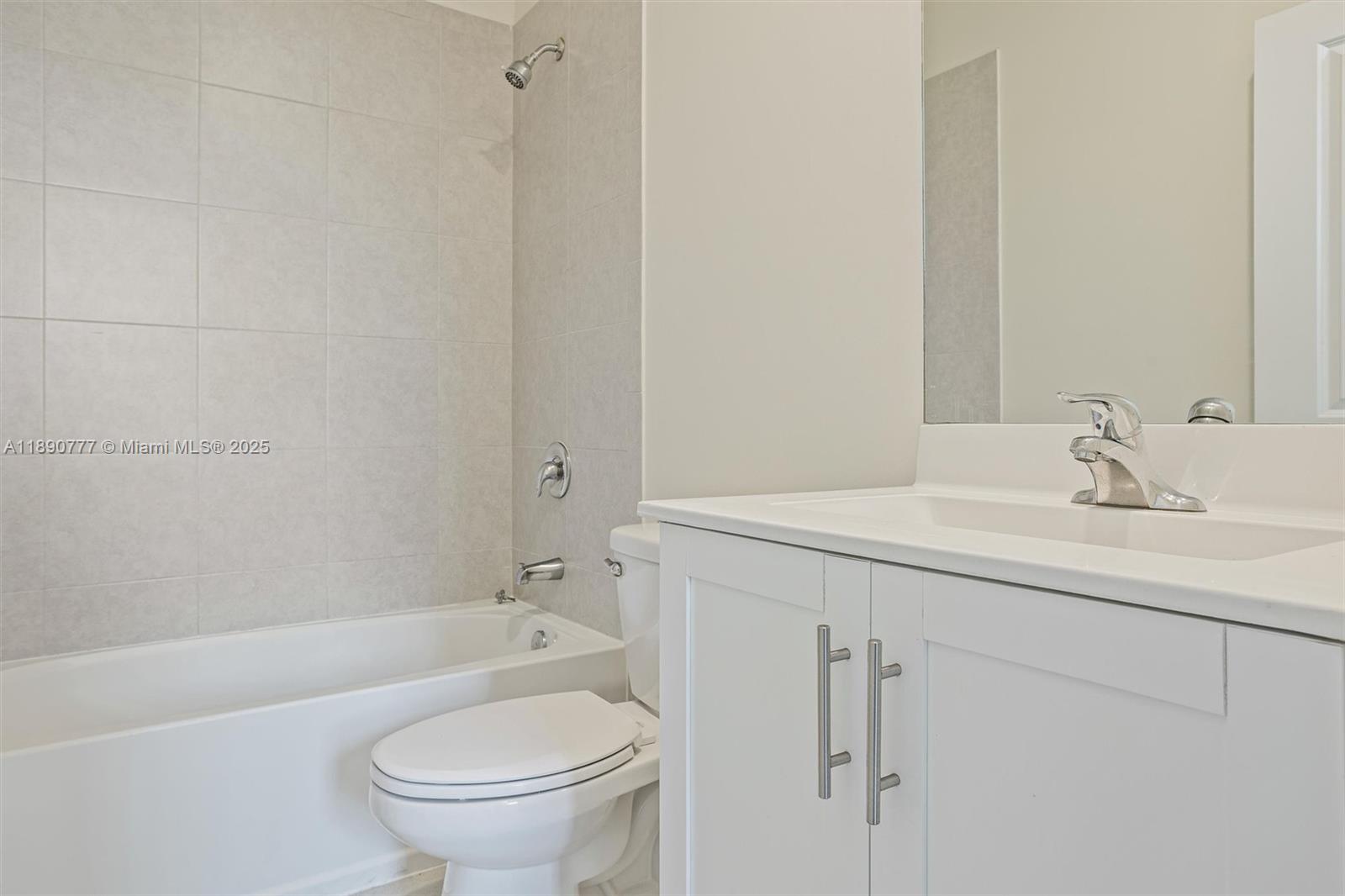 3411 West 112th Terrace Hialeah, FL 33018 - Photo 21 of 42 a bathroom with a sink toilet and shower