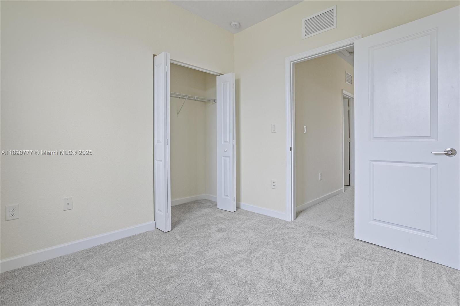 3411 West 112th Terrace Hialeah, FL 33018 - Photo 25 of 42 an empty room with closet