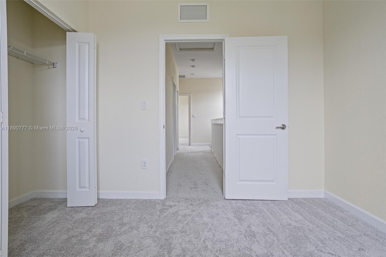 3411 West 112th Terrace Hialeah, FL 33018 - Photo 26 of 42 wooden floor and closet in a room