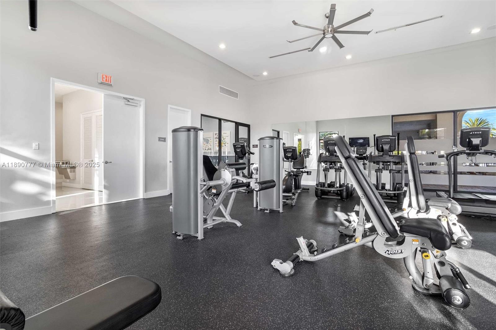 3411 West 112th Terrace Hialeah, FL 33018 - Photo 36 of 42 a view of a room with gym equipment