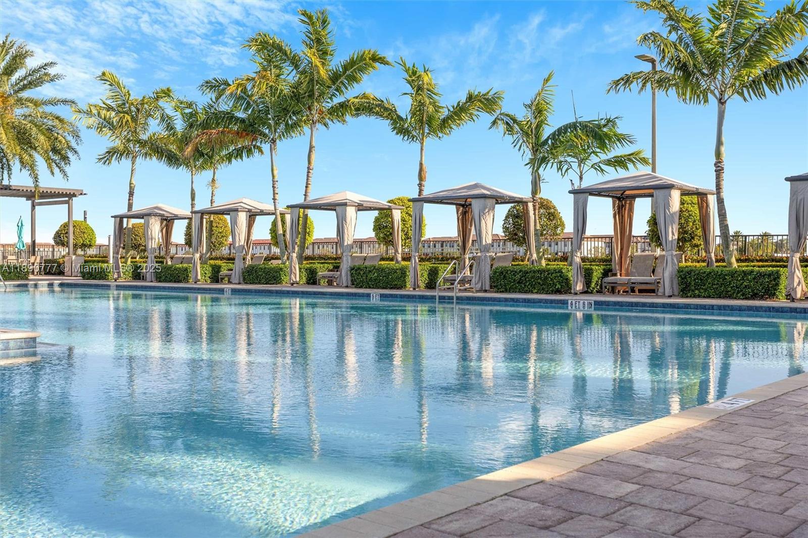 3411 West 112th Terrace Hialeah, FL 33018 - Photo 40 of 42 a view of a lake with a palm trees