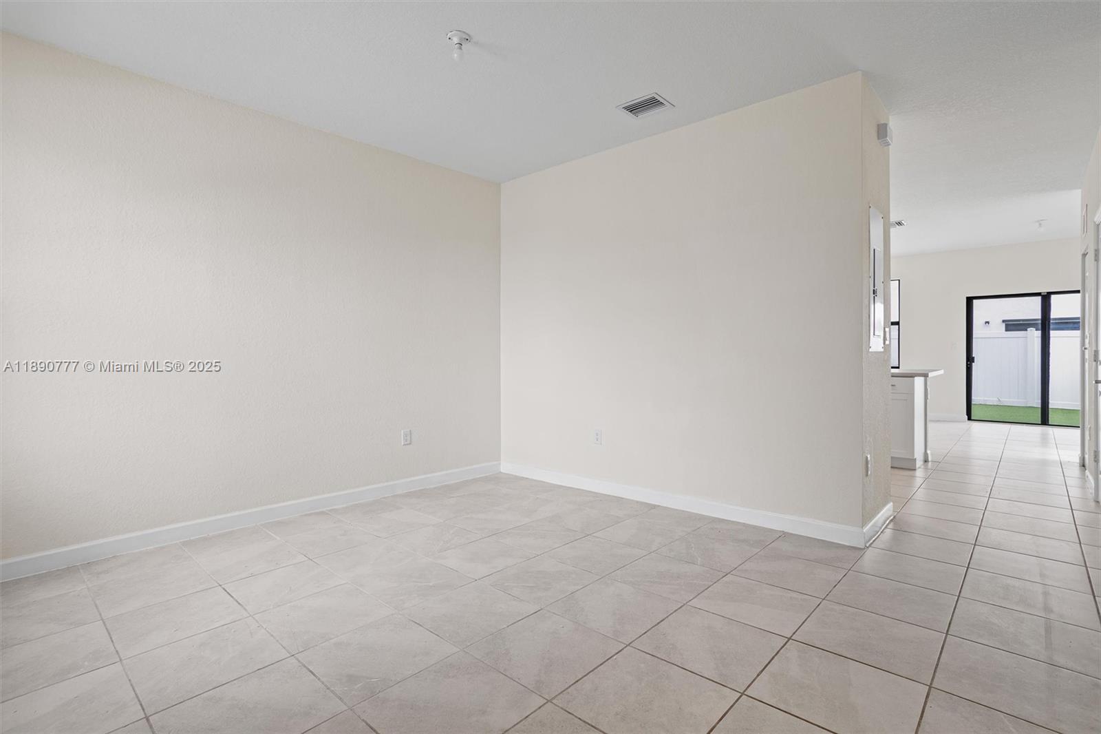3411 West 112th Terrace Hialeah, FL 33018 - Photo 6 of 42 a view of an empty room