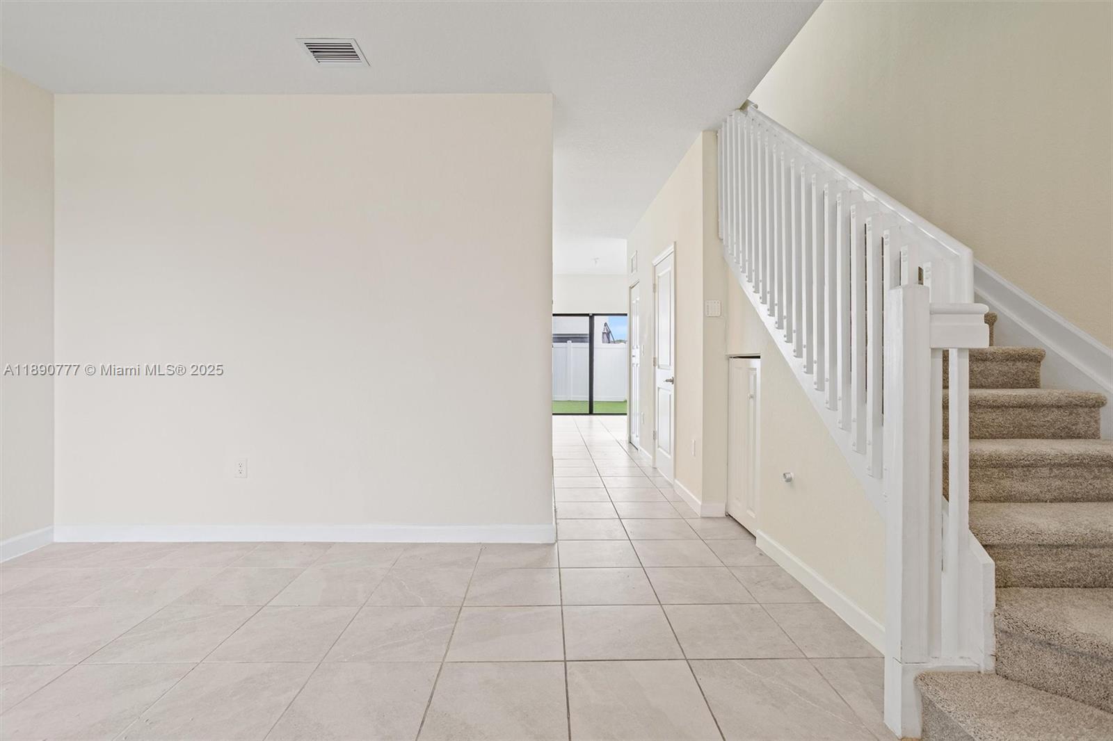 3411 West 112th Terrace Hialeah, FL 33018 - Photo 7 of 42 a view of an entryway with hallway
