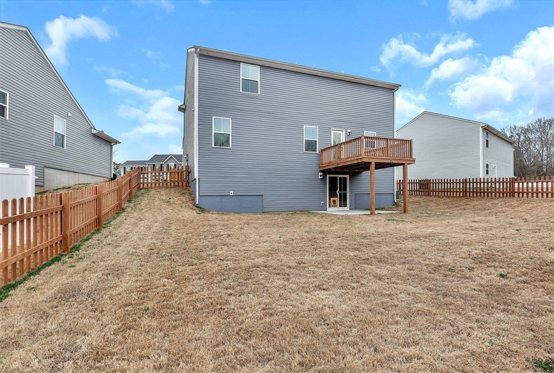 150 Queens Mill Court Pendleton, SC 29670 - Photo 34 of 37 This spacious backyard with a private deck offers ample outdoor living potential.