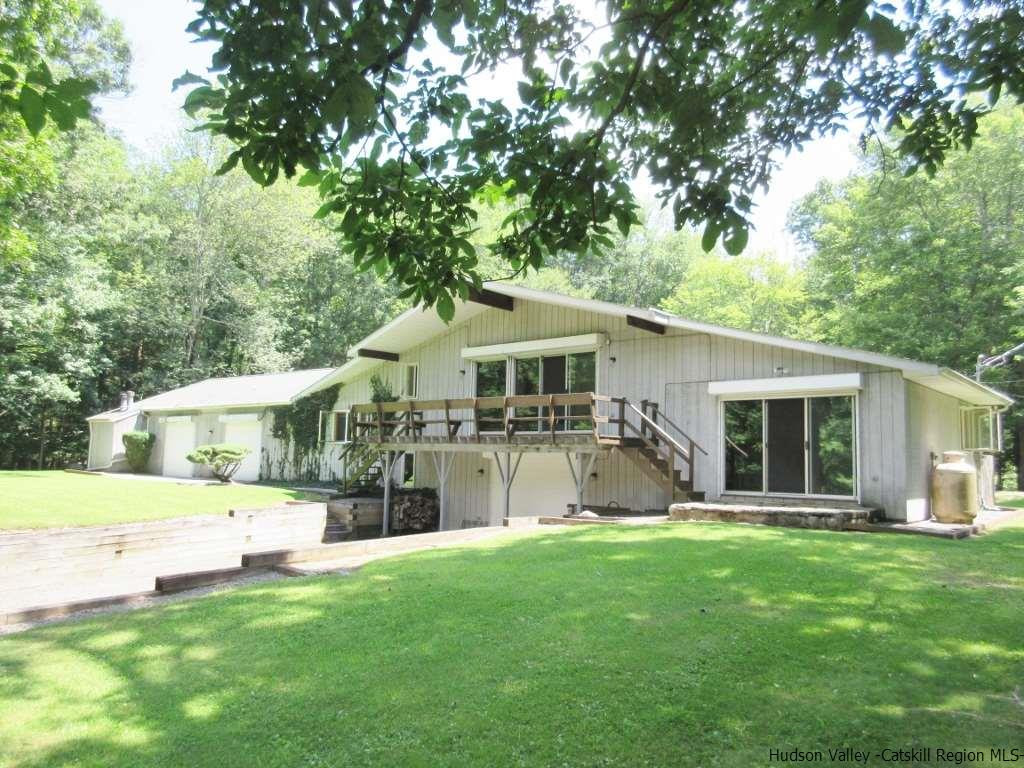 48 Saxton Flats Road Saugerties, NY 12477 - Photo 3 of 21 a front view of house with yard and green space