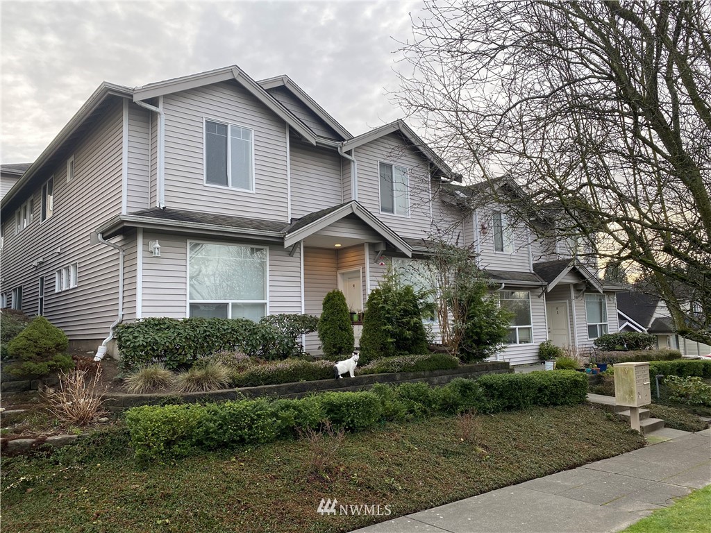 3319 Rockefeller Avenue Everett, WA 98201 - Photo 1 of 7 a front view of a house with garden