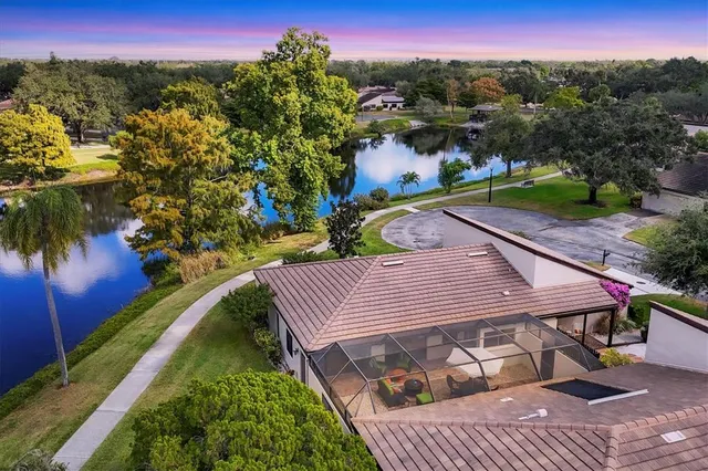 a view of a chairs and table on the wooden floor