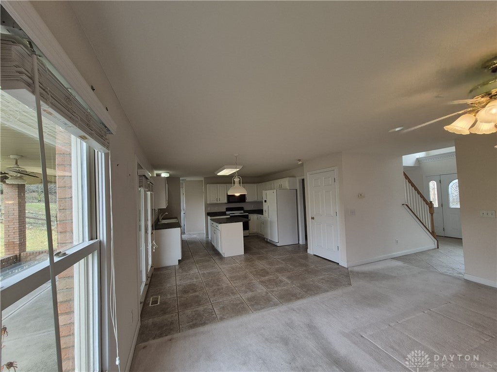 633 Orient Way Hamilton, OH 45013 - Photo 14 of 68 This bright and airy interior boasts an open concept design with a modern kitchen and an inviting entry.