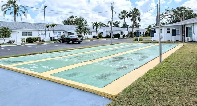 a dining room with lots of tables and chairs