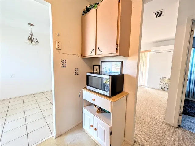 a kitchen with stainless steel appliances a sink and a refrigerator