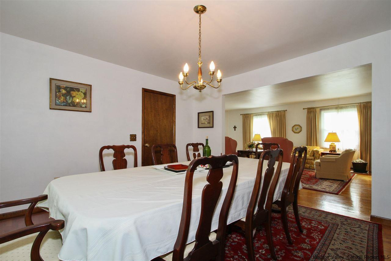 5 Gold Road, Unit 1 Pleasant Valley, NY 12569 - Photo 8 of 24 a view of a dining room with furniture and chandelier