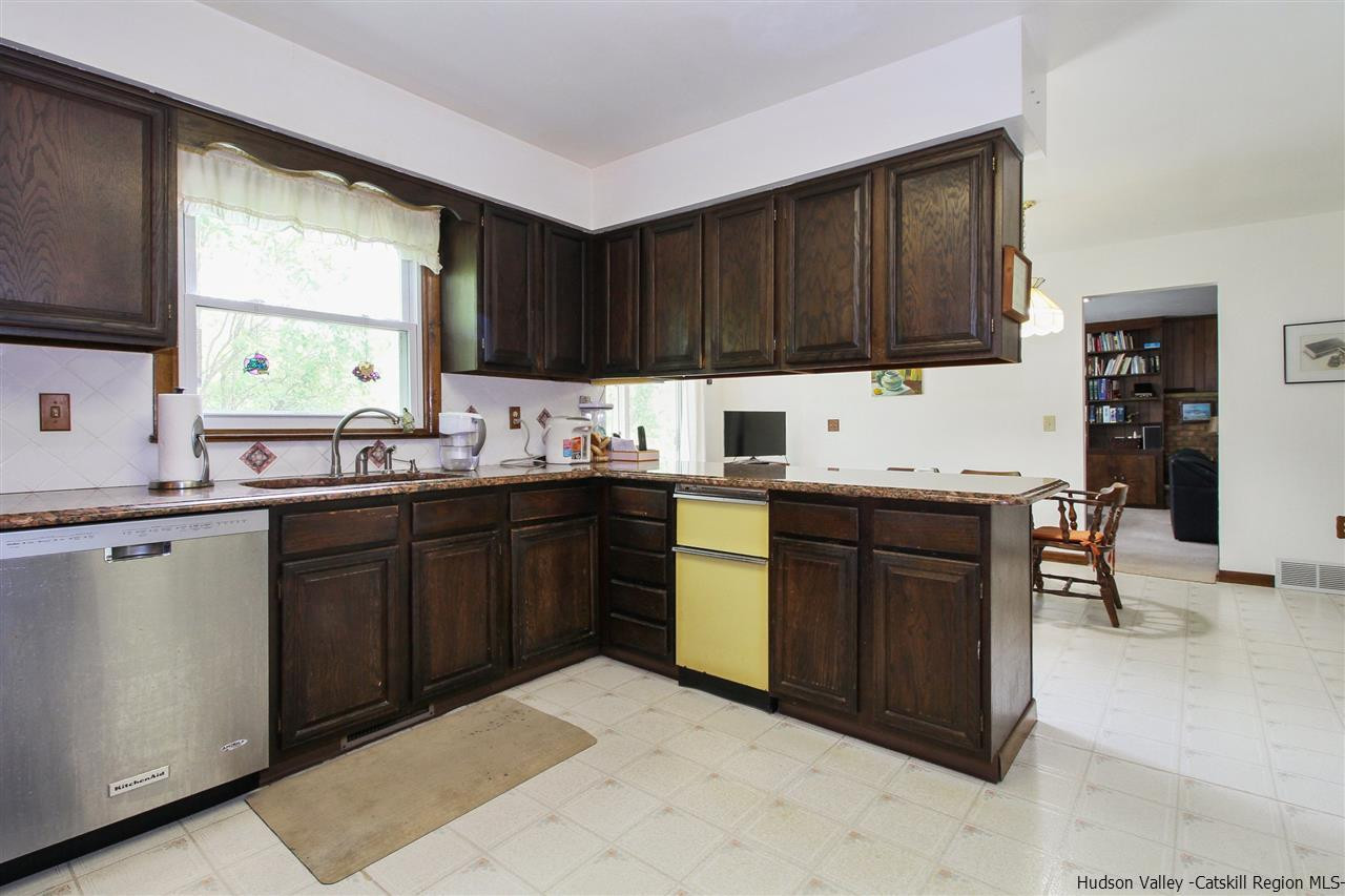 5 Gold Road, Unit 1 Pleasant Valley, NY 12569 - Photo 10 of 24 a kitchen with a sink window and cabinets
