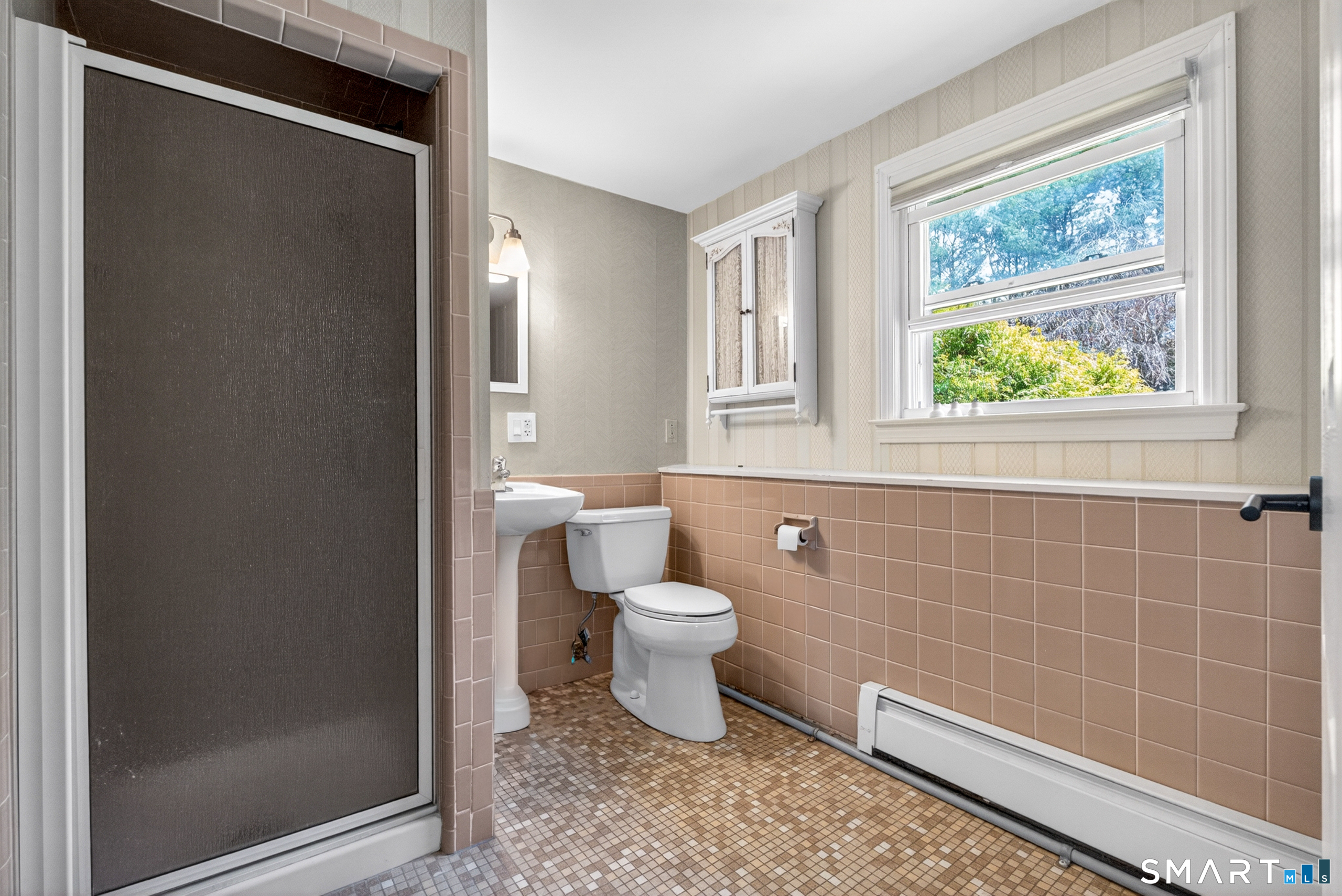 568 Wiese Road Cheshire, CT 06410 - Photo 32 of 40 a bathroom with a toilet a sink and window