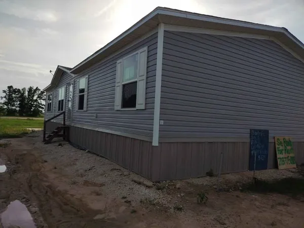 a view of backyard of house