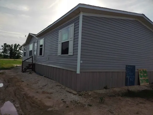 a view of backyard of house