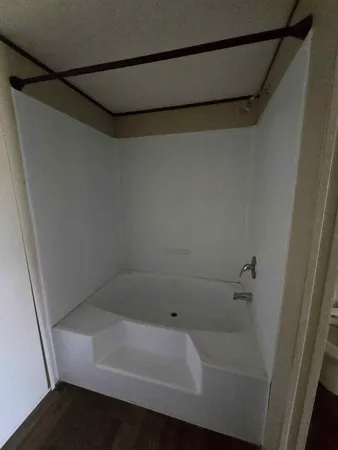 a bathroom with a bathtub