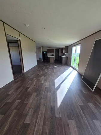 a view of livingroom with hardwood floor and window