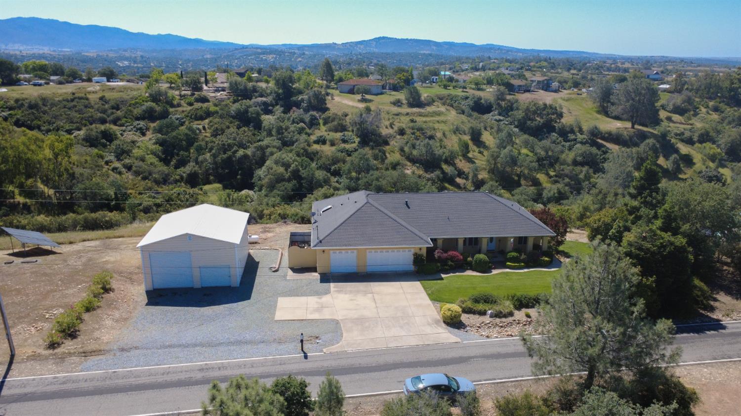 3235 Hagen Road Valley Springs, CA 95252 - Photo 1 of 56 an aerial view of a house with a garden