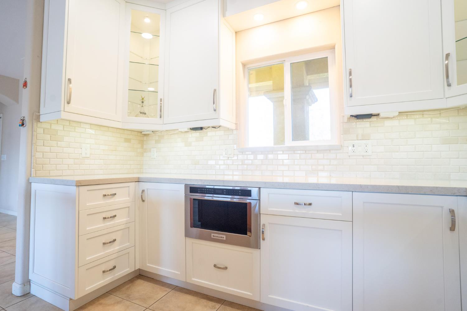 3235 Hagen Road Valley Springs, CA 95252 - Photo 12 of 56 a kitchen with cabinets appliances and a window
